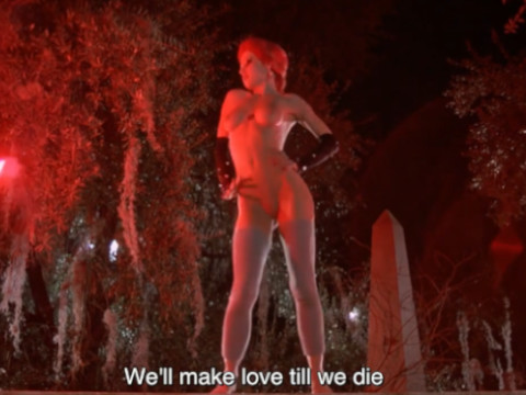 A totally nude woman dancing in the graveyard