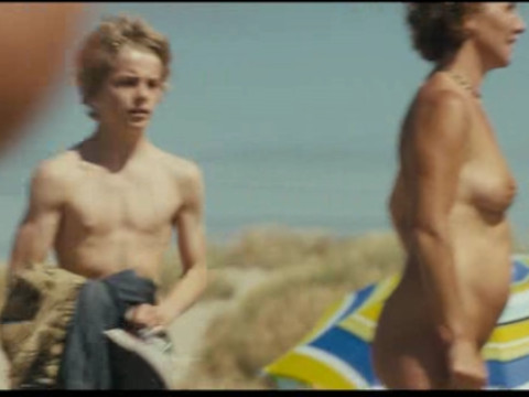 A running through nudist beach