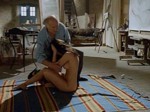 Artist is inspired by the beauty of a woman and begins to paint